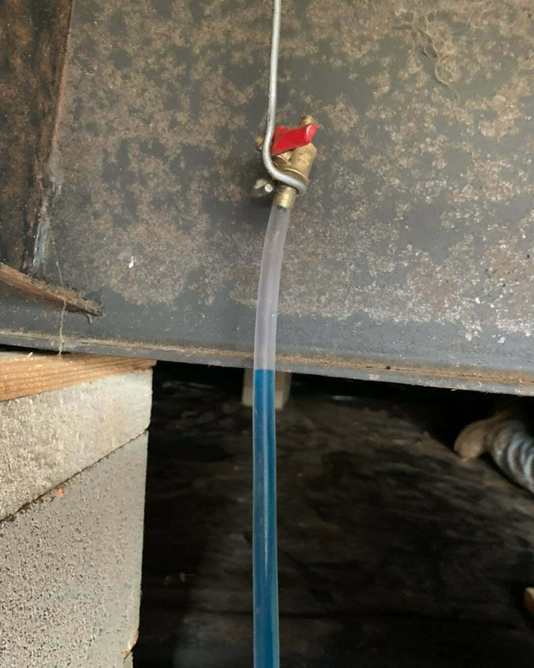 Leveling tool used to measure foundation alignment during repair work.