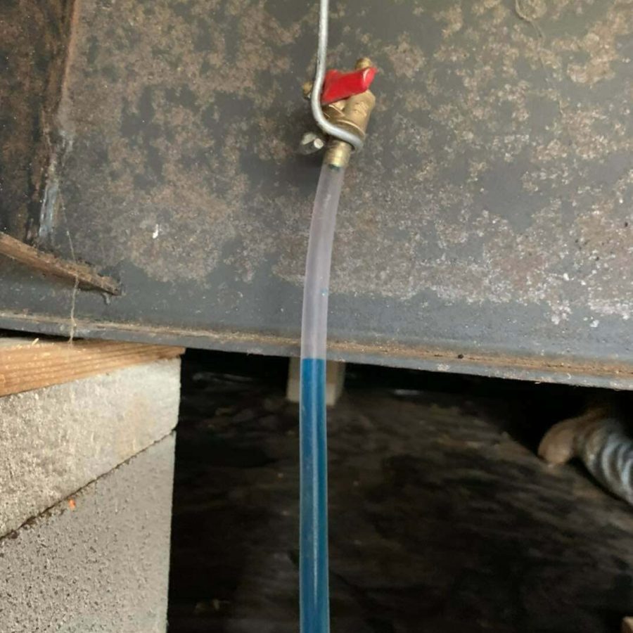 Leveling tool used to measure foundation alignment during repair work.